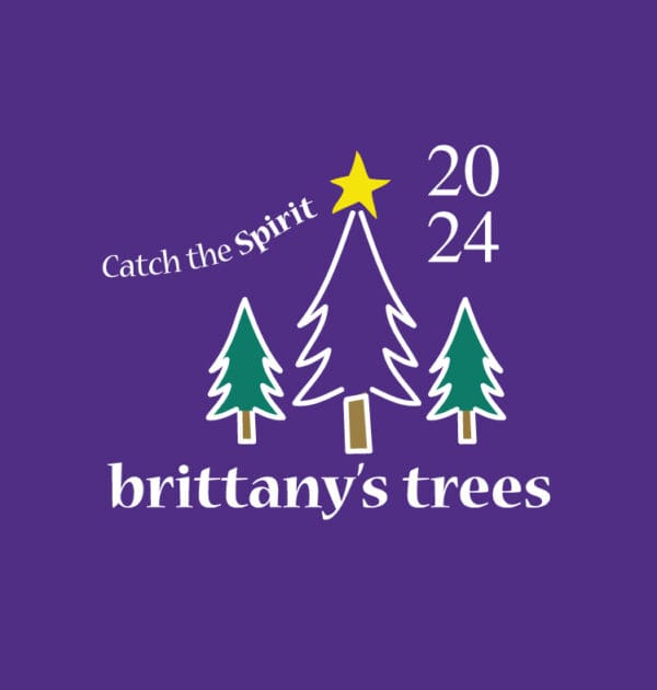 A purple t-shirt with three trees and a star.